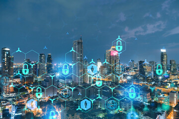 Fototapeta na wymiar Glowing Padlock hologram, night panoramic city view of Bangkok, Southeast Asia. The concept of cyber security to protect companies. Double exposure.