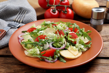 Delicious turnip salad served on wooden table