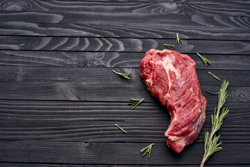 meat beef rosemary steak ingredients wooden table