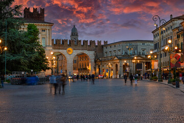 Medieval Gates to Piazza Bra in Verona at night, Italy. Architecture and landmark of Verona. Cozy...