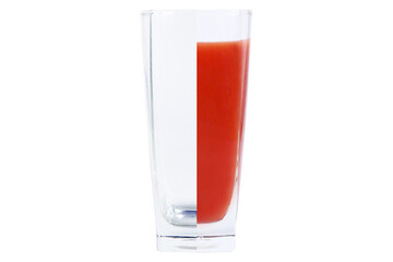 Split glass on the floor , right side with tomato juice, left side empty on an isolated white background.