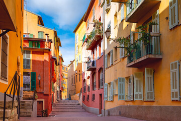 Fototapeta na wymiar Sunny colorful historical houses in Old Town of Nice, French Riviera, Cote d'Azur, France