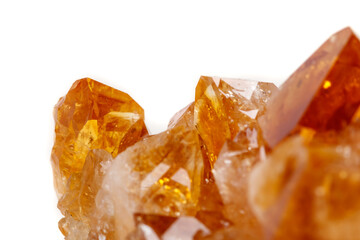 Macro mineral stone Citrine in rock in crystals on a white background