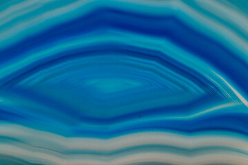 Macro mineral stone Blue Agate breed a white background