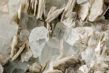 Macro mineral stone Aquamarine in rock on a black background