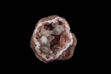 Macro mineral stone Pink Amethyst on a black background