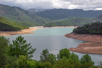 Looking over the shores of the reservoir Tranco de Beas, seen from the vantage point Solana de...
