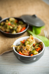 fried brussels sprouts with cauliflower and other vegetables in a bowl