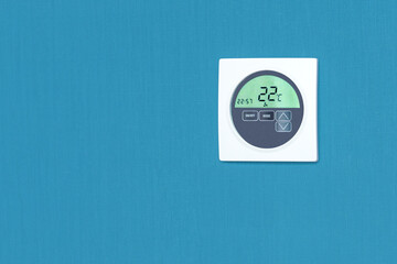 Smart home system device on the wall at home with copy space. Concept control temperature in living...