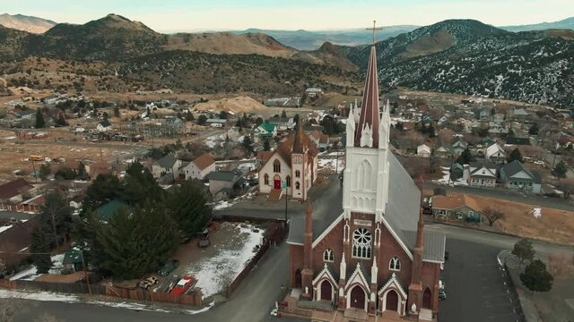 aerial: Historical churches in the mining town of Virginia City, Nevada, USA