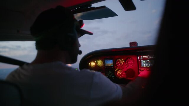 Man flying a small Cessna plane