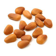 Pine nuts on white background