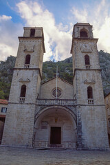 Fototapeta na wymiar Religious architecture. Montenegro. Old Town of Kotor, UNESCO-World Heritage Site. View of Cathedral of Saint Tryphon on cloudy autumn day
