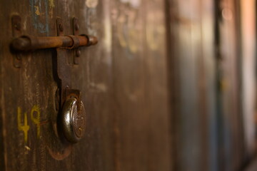 old door handle with padlock
