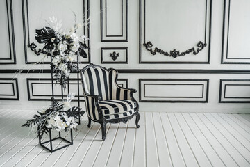 Black and white retro chair in the interior
