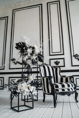 Black and white retro chair in the interior