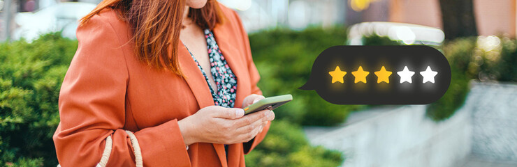 Customer Experience Concept. Excellent. Person using mobile phone with icon two star symbol to...