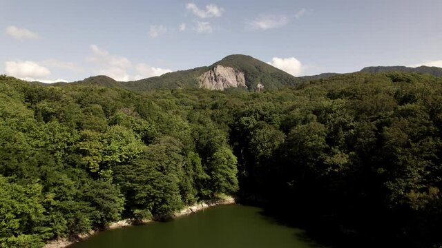 Aerial View, A big lake and a beautiful mountain Filmed with the DJI Mavic AirS2 drone in 5.4K RAW and downscaled to 4K. (Juniko lake in Aomori Japan)