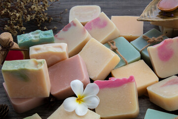 Homemade soap product for bathroom, soap organic handmade with oils, herbal, and lavender ingredient,  natural aromatic spa treatment decoration on wooden vintage background