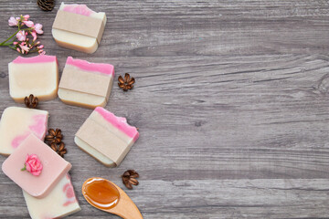 Homemade soap product for bathroom, soap organic handmade with oils, herbal, and lavender ingredient,  natural aromatic spa treatment decoration on wooden vintage background