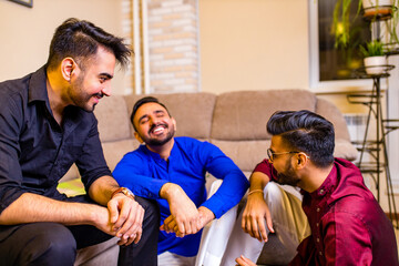 friends from india talking in living room and have fun