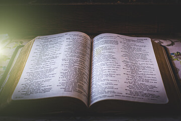 Closeup shot of an open bible with a blurred background