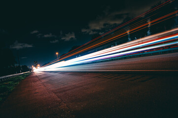Long exposure shot of a highway during nightti