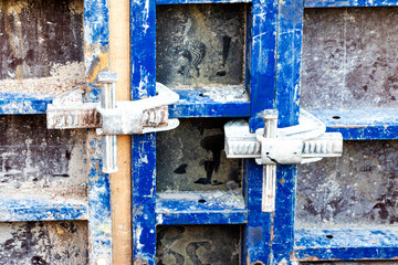 Reinforced concrete foundation of a modern monolithic residential building. Prepared formwork with reinforcing mesh for pouring concrete. Monolithic construction technologies.