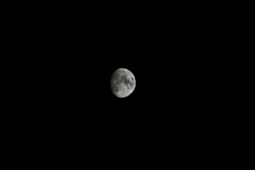 Waxing gibbous Moon in the dark sky