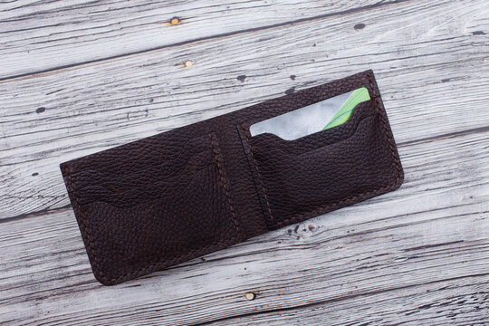 Brown unisex leather wallet. Handmade products made of genuine soft leather. Wallet for money and cards. Open Wallet