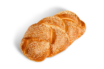 Sweet bun in the form of a braided pigtail, sprinkled with sesame seeds on top