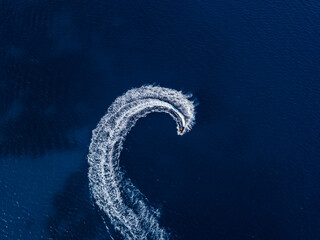 Aerial view on jetski in tropical blue waters