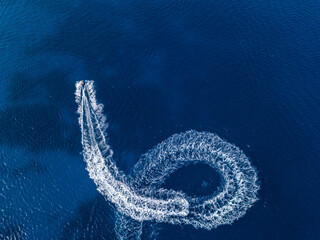 Aerial view on jetski in tropical blue waters