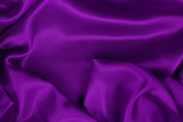 Purple fabric cloth texture for background and design art work, beautiful crumpled pattern of silk or linen.