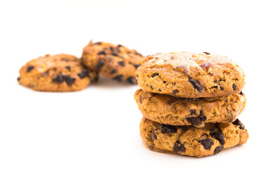 cookies with chocolate and hazelnuts on a white background