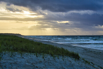 View over the dunes to the Baltic Sea at sunset