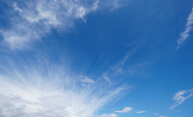 Naklejka na ściany i meble White cumulus clouds formation in blue sky background