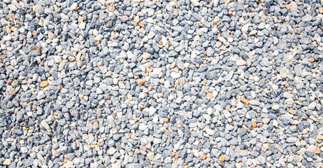 Area pattern of white, gray, black pebbles.