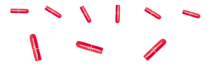 Colorful tampons isolated on the white background, a plug of soft material inserted into the vagina to absorb menstrual blood