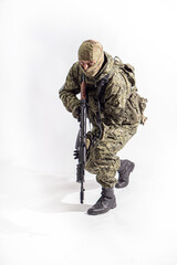 Members of the Special Forces unit. Russian Special Operations fighter with AK-74 assault rifle
 on a white background
