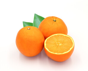 halved orange and green leaves isolated on white background