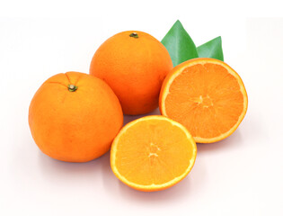 halved orange and green leaves isolated on white background