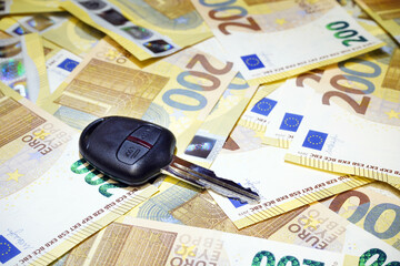 A bunch of keys lies on the background of money. A good deal for the sale of apartments. Rent. Buying a property. Success. Buying and selling a house                           