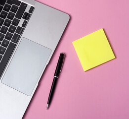 Home office stuff with laptop, notebook, cup of coffee and other supplies. Flat lay photo. Top view. Freelance concept