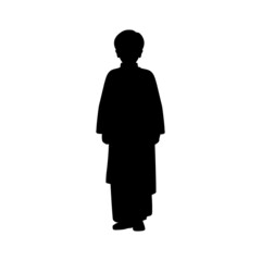 Silhouette of little boy in national asian costume.