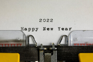 Happy New Year 2022 written on an old typewriter