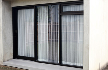 Open plan living area with sliding glass door