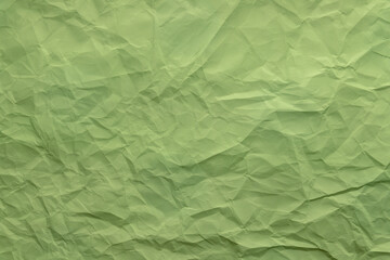 crumpled paper. sheet of green paper. detailed high resolution texture. abstract background for wallpaper.