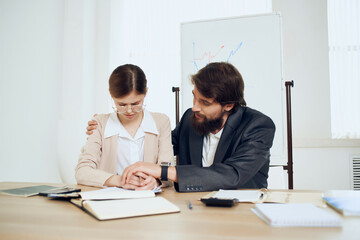 Fototapeta premium business man and woman business colleagues at work harassment problem