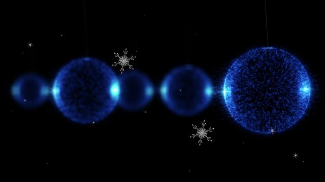 Animation of christmas baubles over snow falling on black background